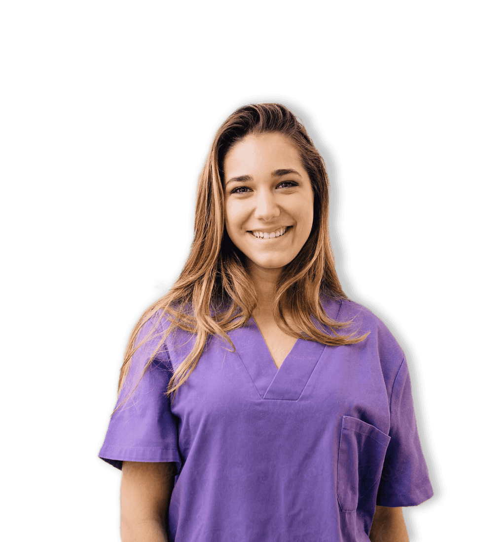 Et billede af en smilende sygeplejerske